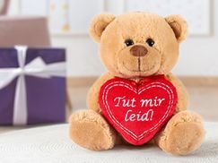 Herzliche Botschaft auf rotem Kissen