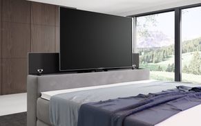 Bett mit integriertem TV Lift für maximalen Komfort