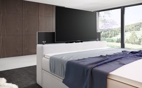 Integrierter TV Lift für maximalen Komfort