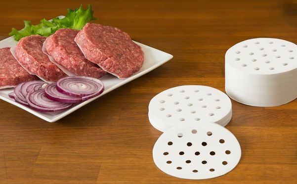 Hochwertiges Trennpapier sollte bei keiner professionellen Burger Pattie Produktion fehlen