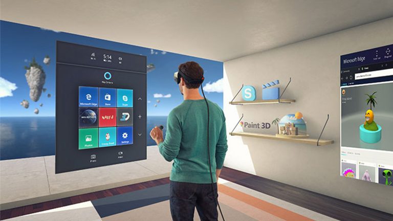 Mann steht im Raum vor Windows-10-Schaltfläche und