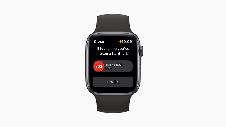 Apple Watch SE Die Apple Watch SE mit grauem Gehäuse, schwarzem Solo-Loop aus Gummi und aktivierter Sturzerkennung.