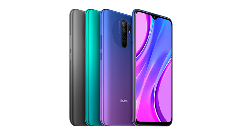 Xiaomi Redmi 9 Das Xiaomi Redmi 9 stehend in den Farben Grau, Grün und Violett.